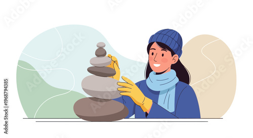 Woman Building Balanced Stone Stack Serenity In Winter Outdoors