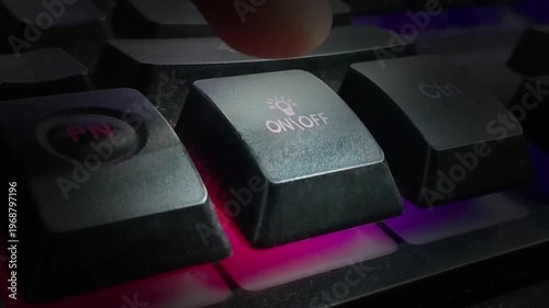 Hand on keyboard with light is toggling on and off animation. Finger pressing Light on off command on the keyboard.