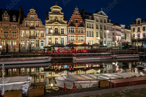 Canvastavla Night view of Graslei quay with guild houses and tour boats, Ghent