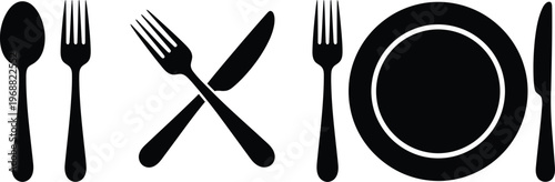 Black silhouettes of dining utensils and plate on white background