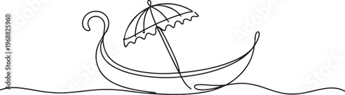Fotografía A boat with an umbrella