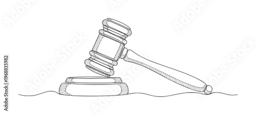 Black and white of a gavel resting a sounding block judge