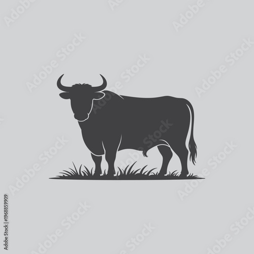 Standing bull silhouette with head turned forward