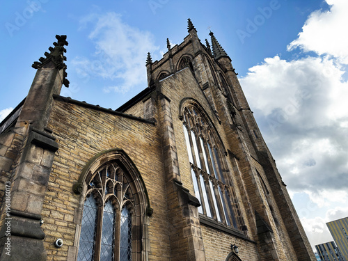 Fotografie Gothic Oratory Church of Saint Chad's facade in Manchester, UK with towering sto