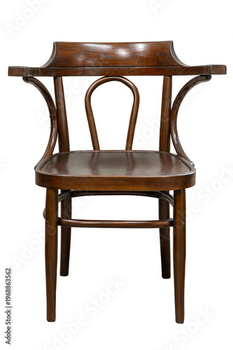 Classic wooden chair exudes timeless elegance in a rustic setting ideal for cozy gatherings or quiet reading moments