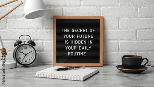 A motivational letter board display revealing the profound secret to unlocking a successful future through consistent daily routines, inspiring productivity and mindful habits.