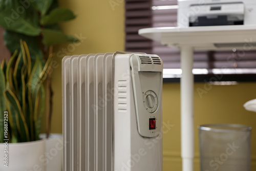 Принти на полотні Modern portable electric heater in room, closeup
