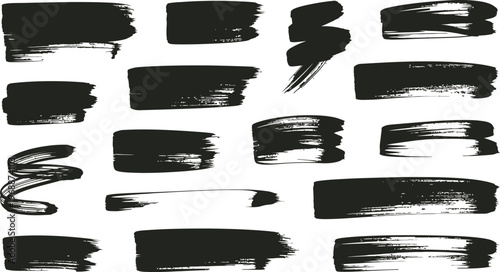 Collection of various black ink brush stroke textures isolated on a white background for design elements