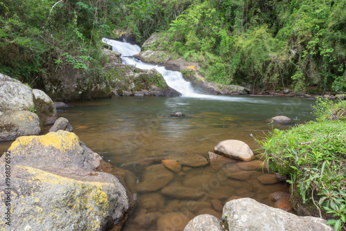 Waterfall and pond in a rainforest in Brazil
