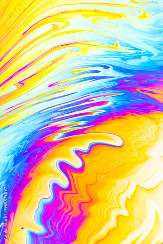 Close up on a soap bubble with random abstract forms and colors for background