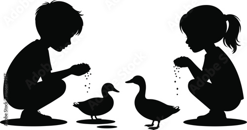 Black Silhouette of a Young Boy and Girl Crouching Down to Feed Two Ducks Representing Childhood Innocence Kindness to Animals and Outdoor Nature Interaction