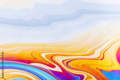 Close up on a soap bubble with random abstract forms and colors for background