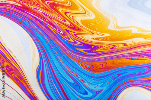 Close up on a soap bubble with random abstract forms and colors for background