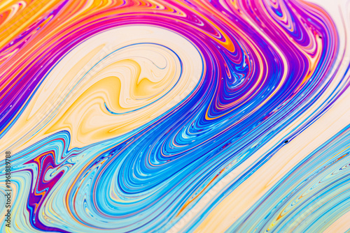 Close up on a soap bubble with random abstract forms and colors for background