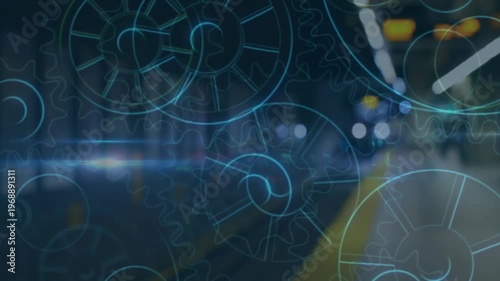 Animating abstract gears over blurred train station background, motion concept