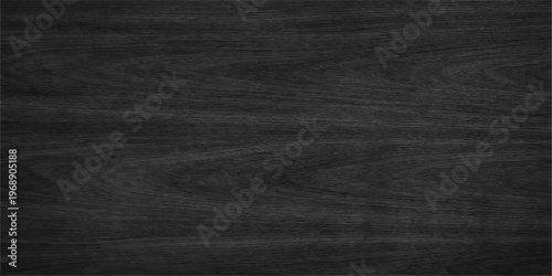 Black canvas fabric texture with a dark rough textile pattern and a grunge vintage linen surface provides a blank grey material backdrop for a textured paper or leather wallpaper