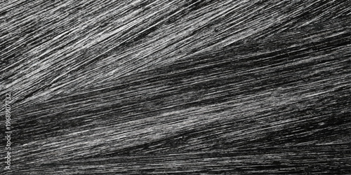 Black fabric texture and abstract wooden pattern material design with a rough natural grain surface and dark macro light backdrop