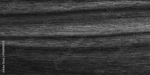 A dark grunge black and white fabric texture background reveals a rough vintage material pattern with a weathered wooden plank design and natural brown timber surface