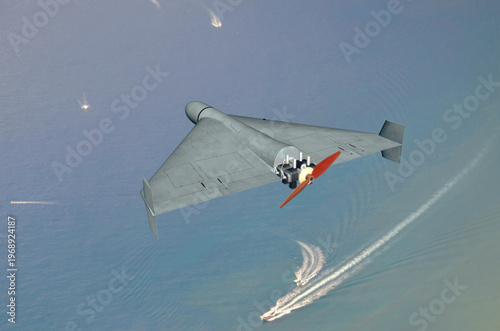 Unmanned drone flying over sea where boats create wake trails