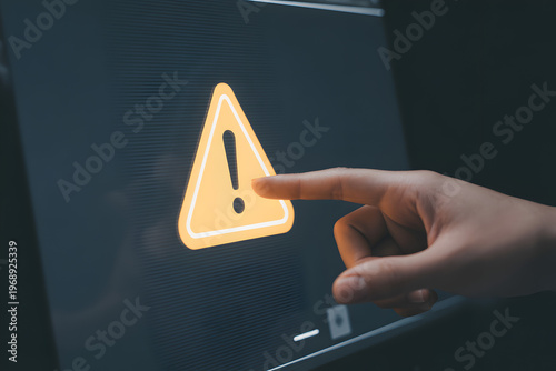 Human Finger Touching Digital Warning Sign with Triangle Exclamation Mark Icon, Alert System Notification for Cyber Security Threat, Emergency Error and Risk Management in Modern Digital Environment