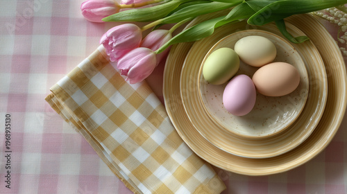 Spring brunch flat lay with pastel eggs tulips and plate
