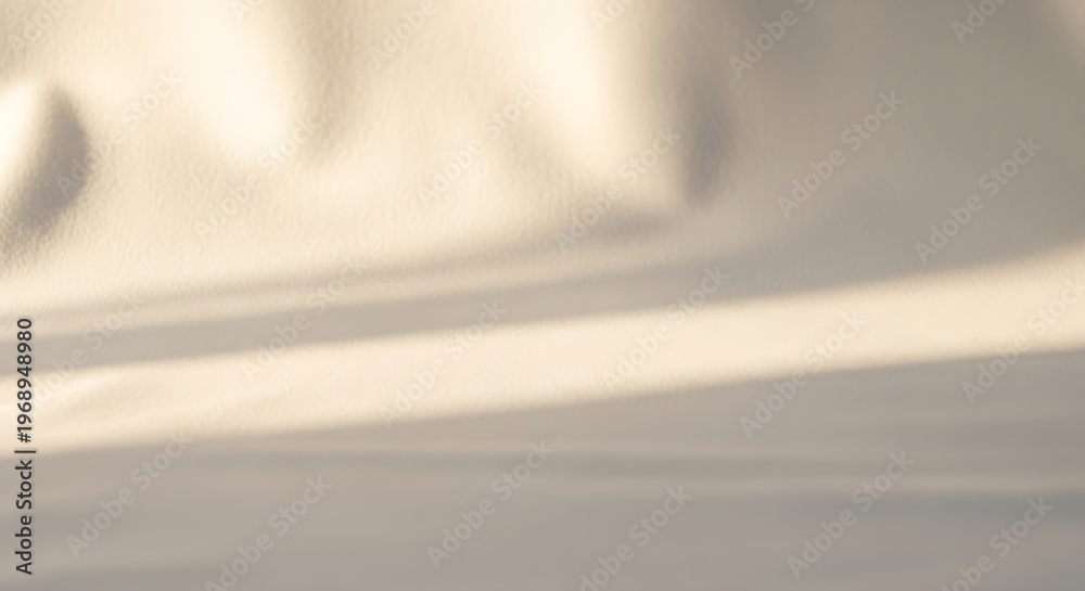 Obraz premium a close-up view of a beige fabric with sunlight shining on it
