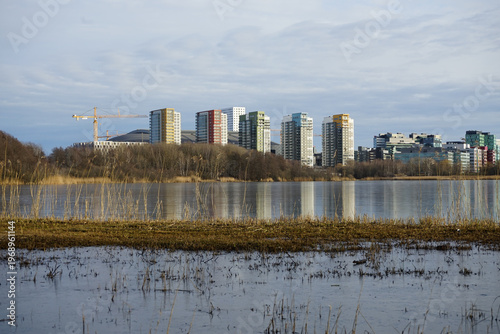 Scenic view of a city by the lake