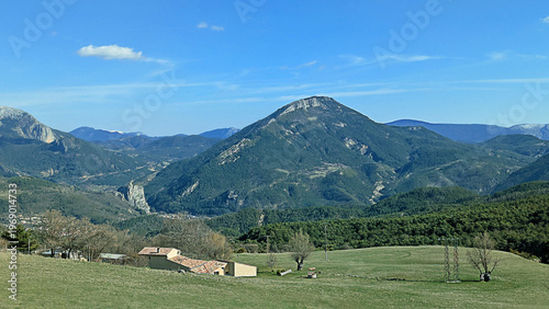 Stunning Provence Landscape with Rolling Green Hills and Majestic Mountains