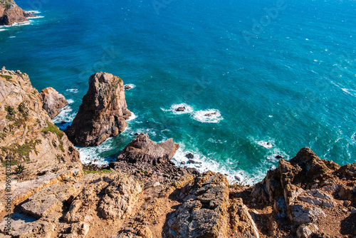 Cabo da Roca, Portugal near Sintra, Lisbon district. Dramatic cliffs in Atlantic ocean. Most western point of Europe. Beautiful seascape with rugged coast