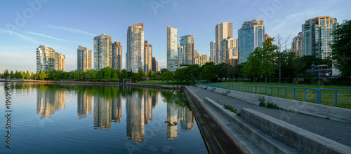 Quiet Sunrise Reflection False Creek Vancouver Panorama. Yaletown towers across the False Creek shoreline at sunrise in Vancouver. British Columbia, Canada.
