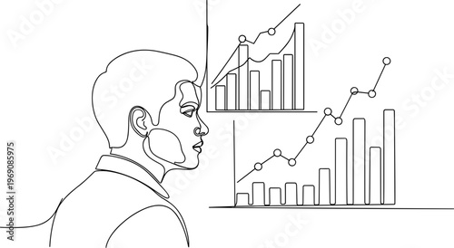 Businessman looking at financial charts.