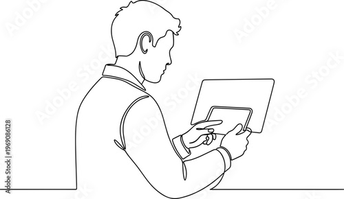 Man holding and using a tablet.