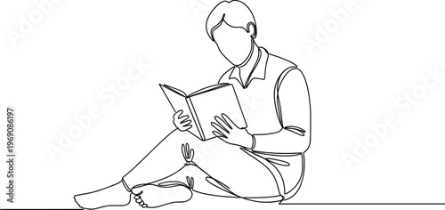 Man sitting and reading book.