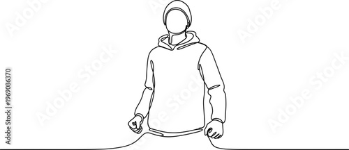 Person Wearing a Hoodie Standing.