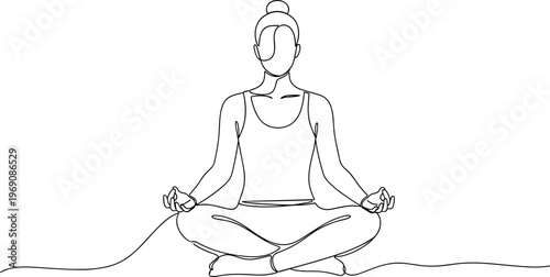 Woman in meditation sitting crosslegged.