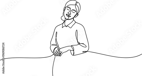 Woman standing with folded arms looking.