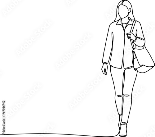 Woman walking with handbag and smiling.