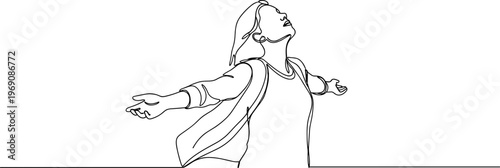 Woman with outstretched arms feeling free.