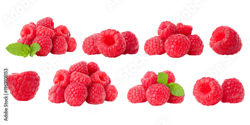 Raspberries placed in clusters with mint leaves, PNG