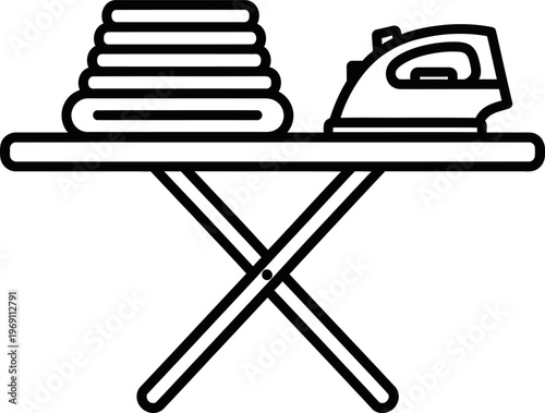 Ironing board with iron and folded clothes