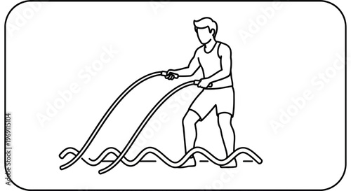 Male athlete performing intense battle rope exercises for strength and conditioning workout