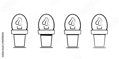 Four identical toilet paper holders with rolls of varying usage levels