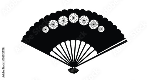 Traditional japanese fan with intricate moon and star decorations