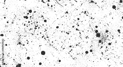 Abstract black ink splatter texture on white background for grunge design elements