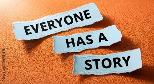 Fototapeta Everyone Has a Story: Inspirational Quote on Torn Paper