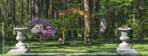 Outdoor Wedding Ceremony Setup with Wooden Arch in Garden Forest Setting