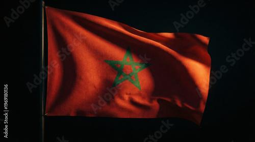 Moroccan flag waving on a black background