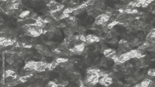 A close-up grayscale image of a rocky surface with various stones and pebbles. Perfect for backgrounds, textures, and design elements.