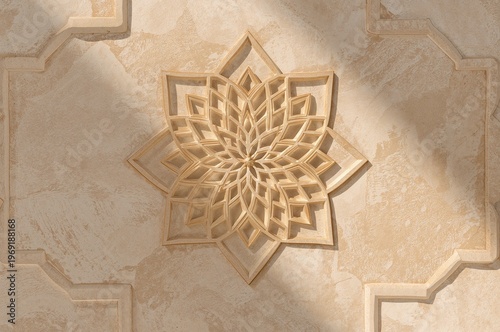 Sunlit Ornate Islamic Geometric Star Carving on Textured Stone Wall with Dramatic Shadows.