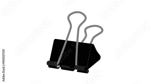 Black binder clip office supply.